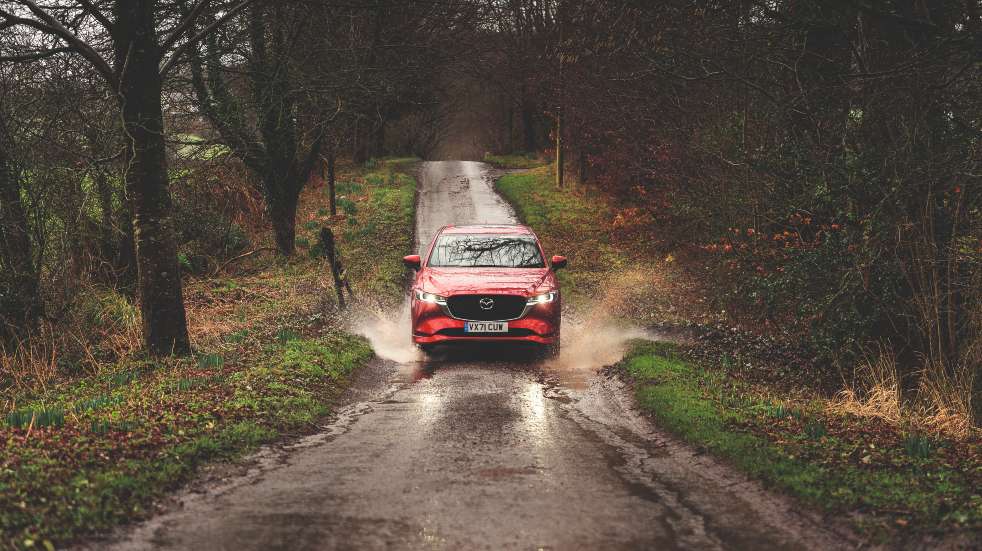 Mazda cx-5 drivingthrough puddle on salisbury plain